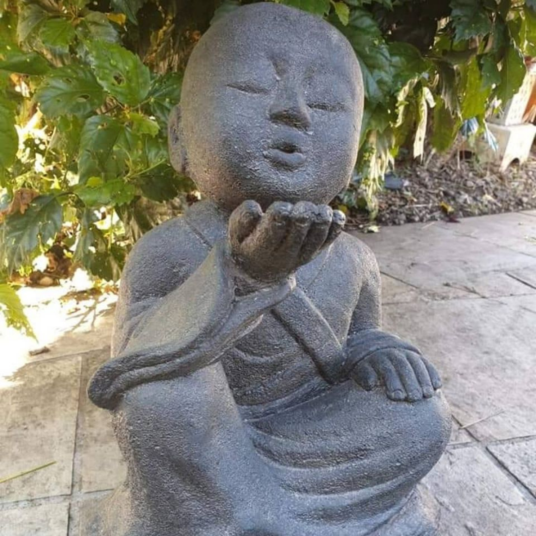 Kiss Blowing Buddha Monk Statue