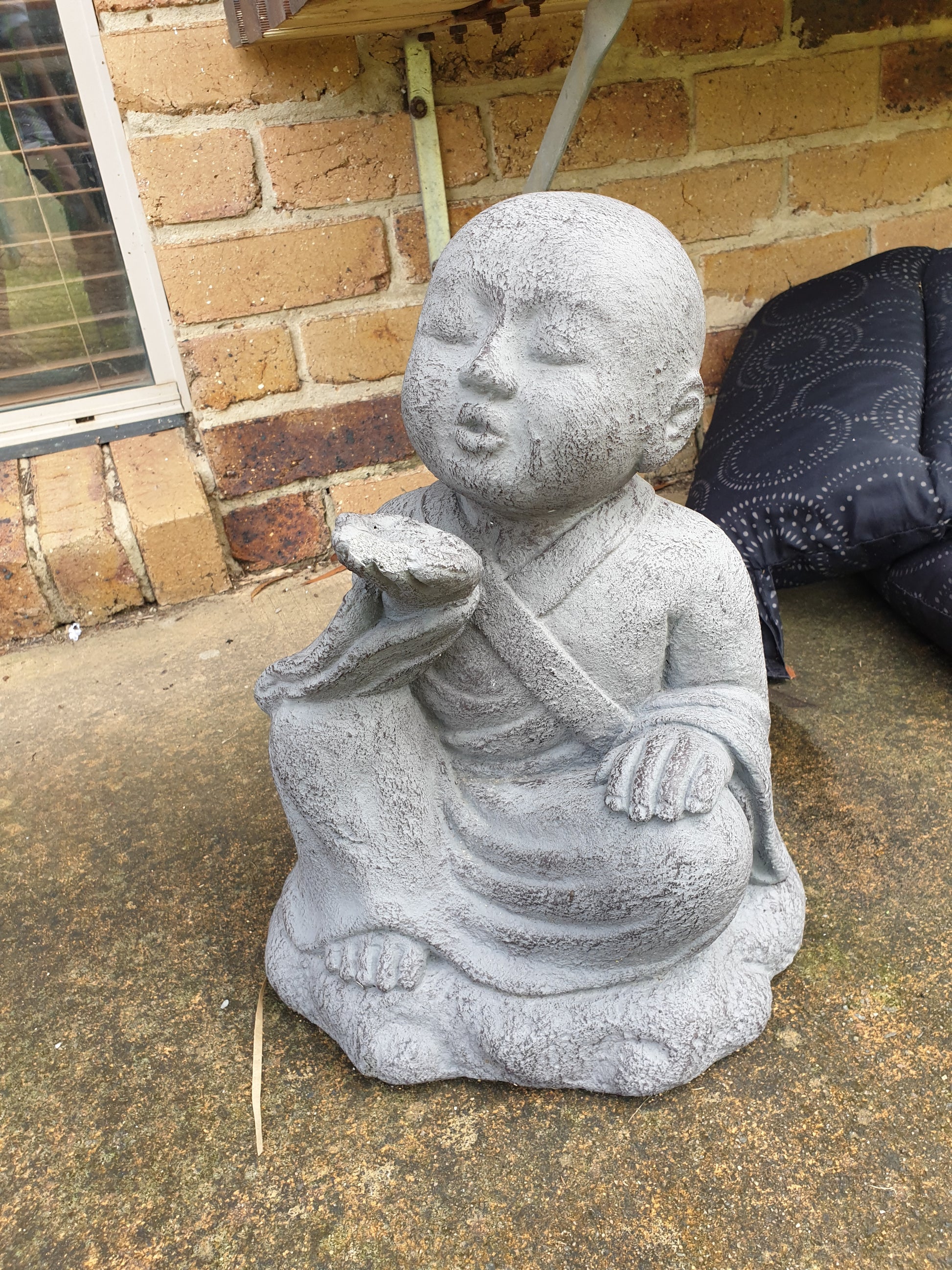 Kiss Blowing Buddha Monk Statue