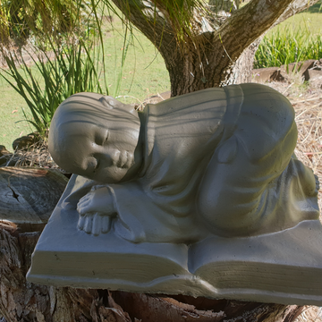 Sleeping Monk on Book Statue